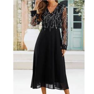 Black cocktail dress with sparkle accents. Size Large